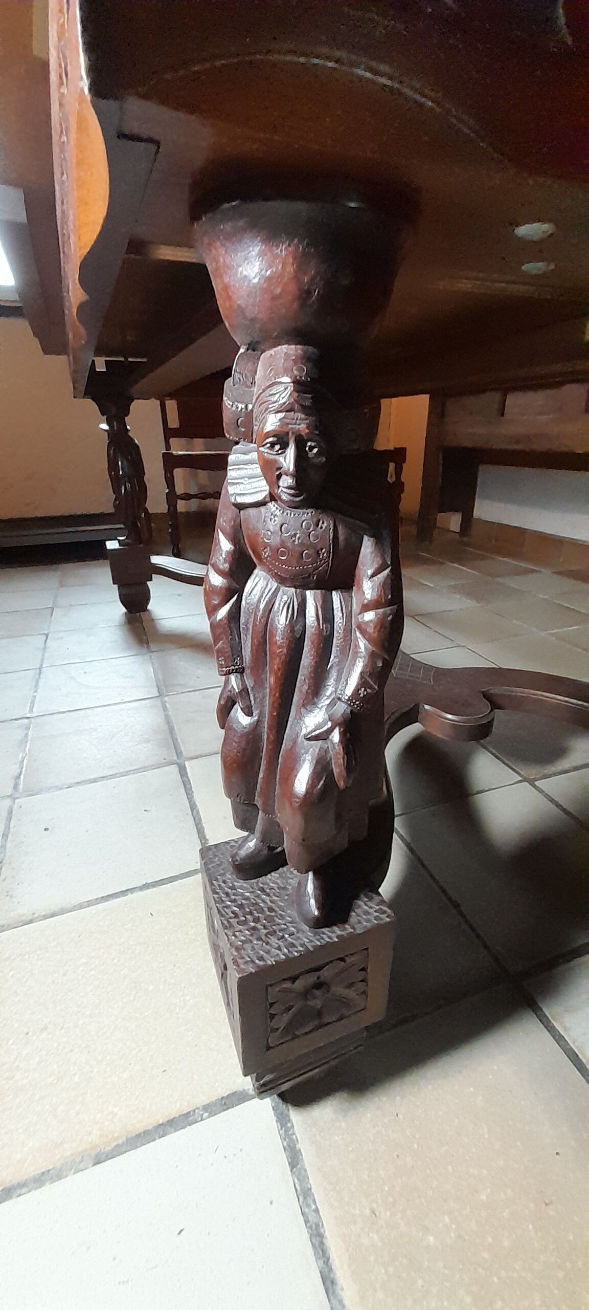Breton dining room table with 2 extensions and 6 chairs with carved Breton characters