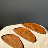 Trio of rounded triangular shaped trays or cups in monoxyl teak