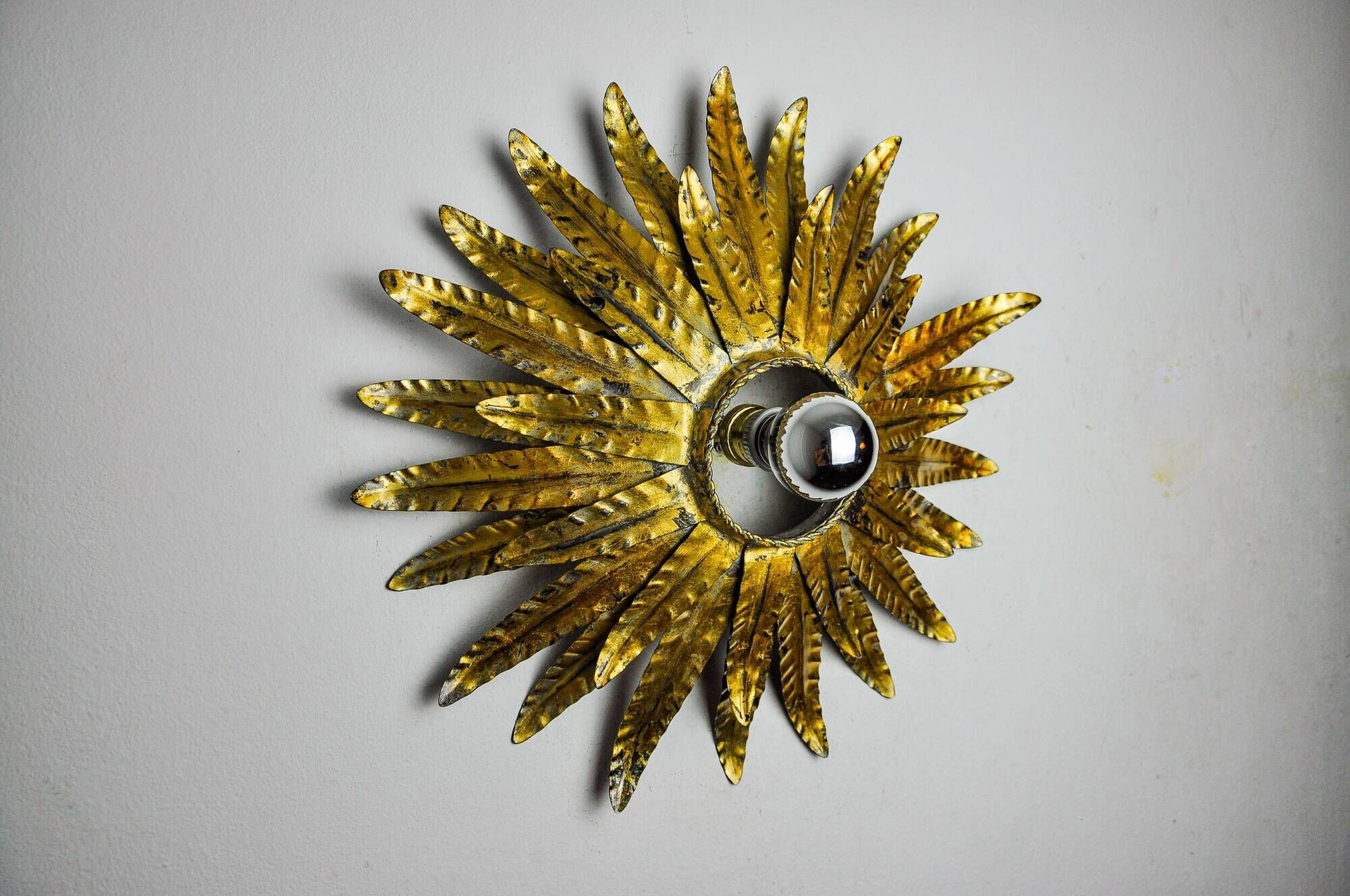 Sun wall lamp by Ferro Arte, metal and gold leaf, Spain 1970