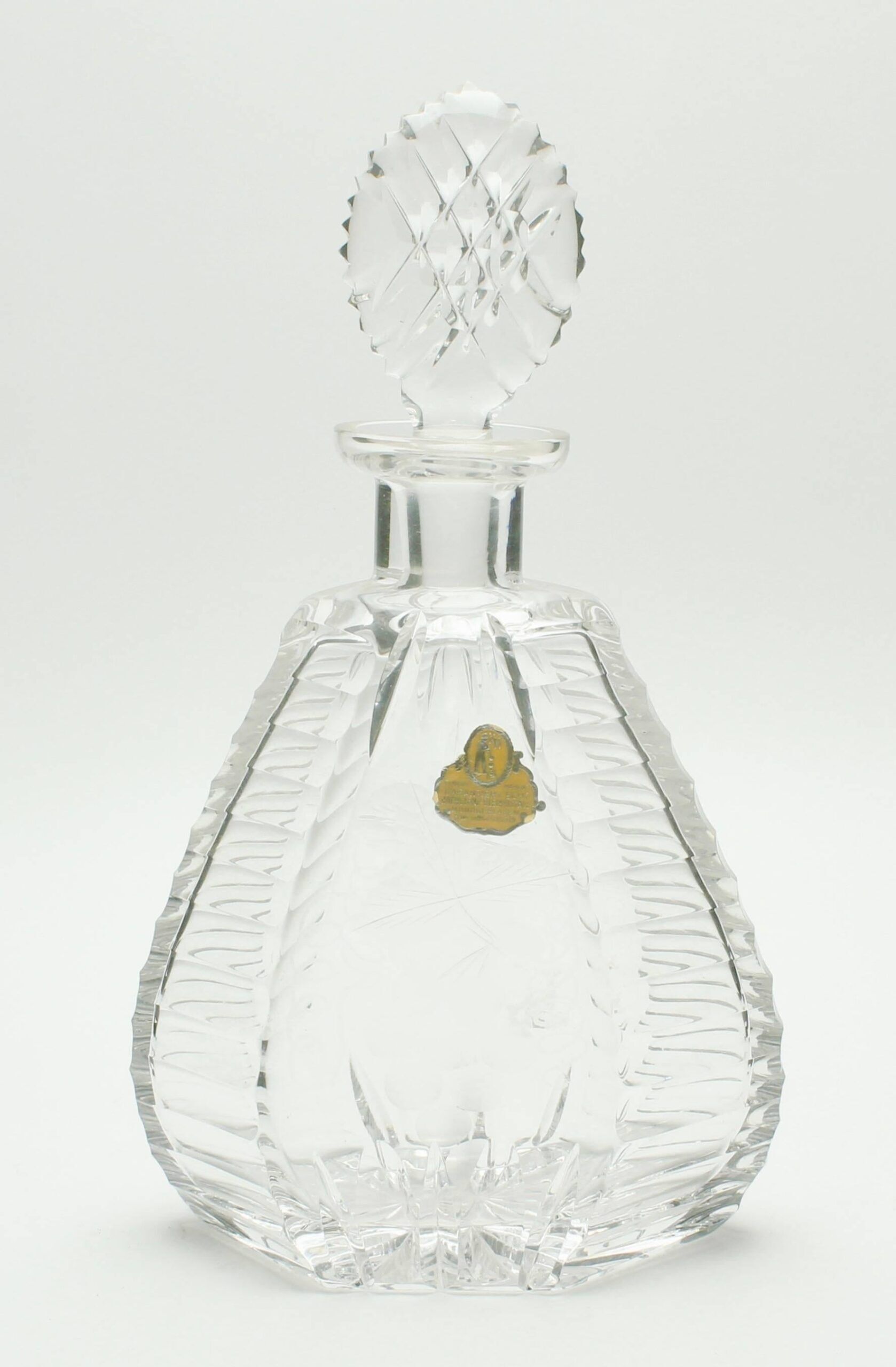 Matching pair of bohemian crystal decanters with art deco motifs