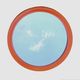 Vintage round wall mirror in orange painted wood - diameter: 48 cm