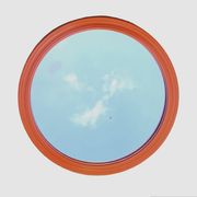 Vintage round wall mirror in orange painted wood - diameter: 48 cm
