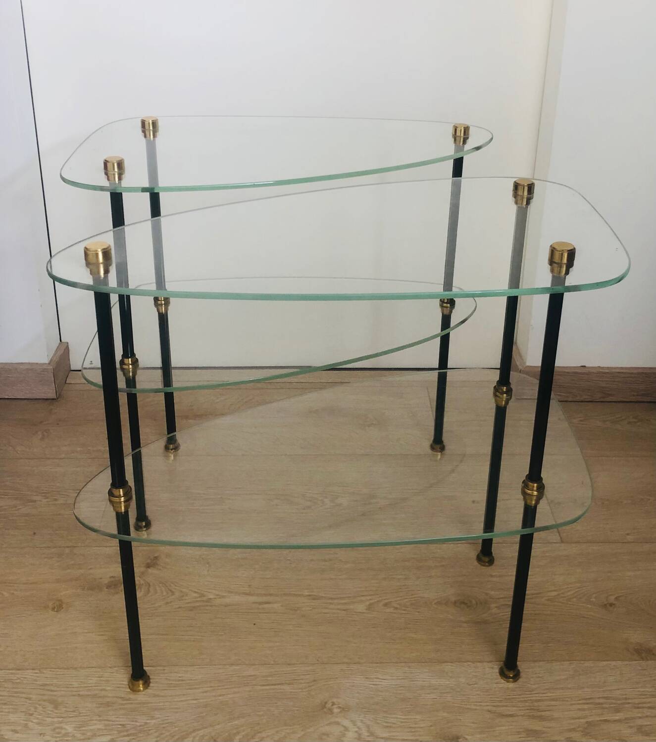 2 small side tables in glass and Bakelite with gold nuts from the 1960s.