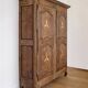 Antique French rustic wardrobe with star inlays.