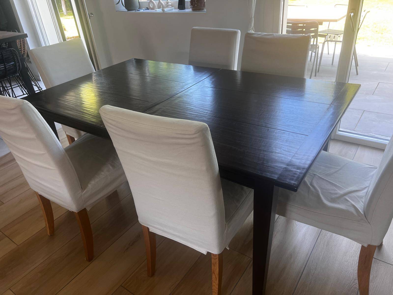 Solid cherry wood dining table, extendable for 8 to 12 people.