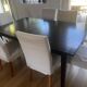 Solid cherry wood dining table, extendable for 8 to 12 people.