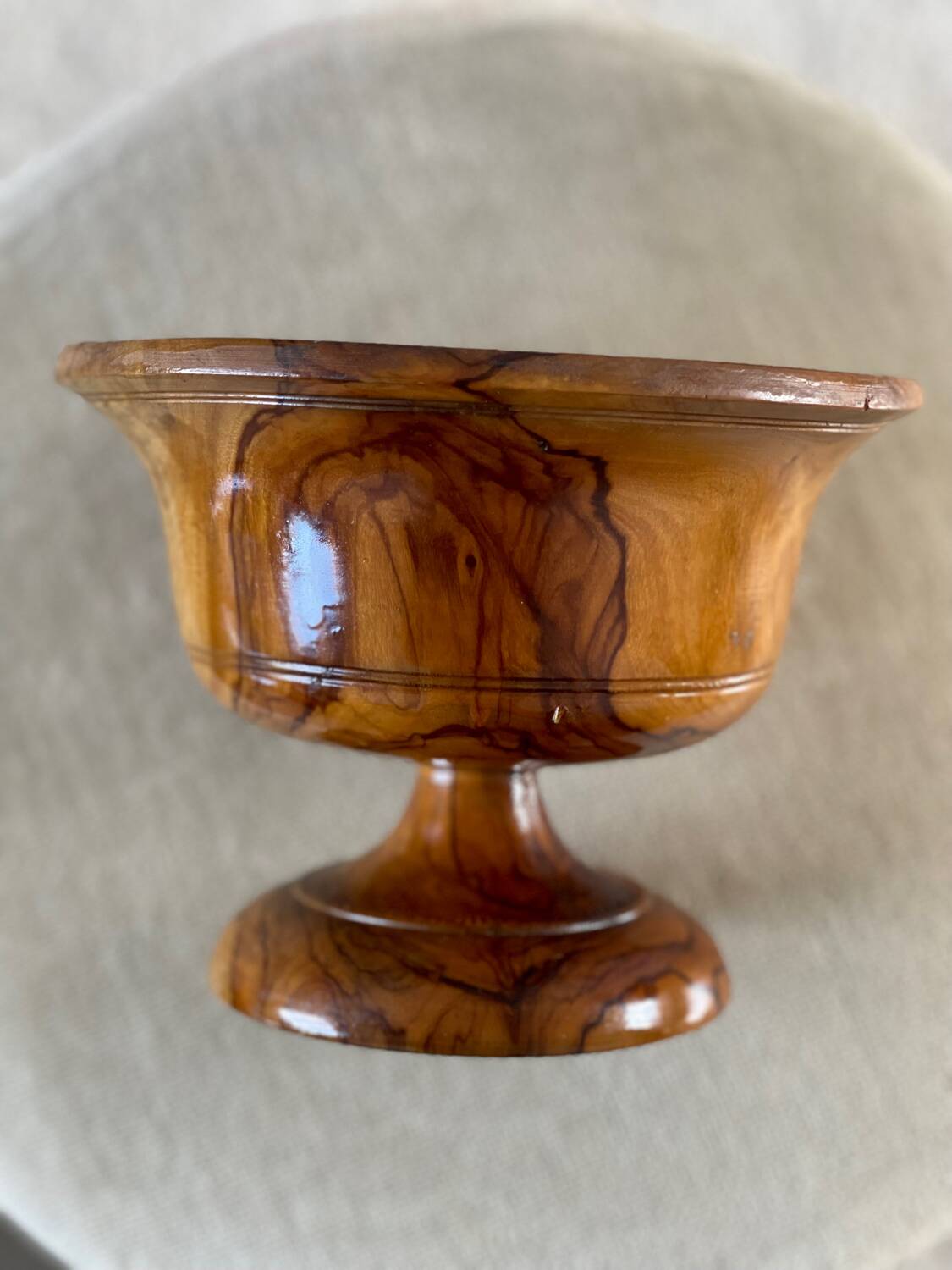 Empty pocket in olive wood