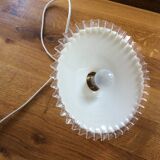 Old suspension in dented opaline