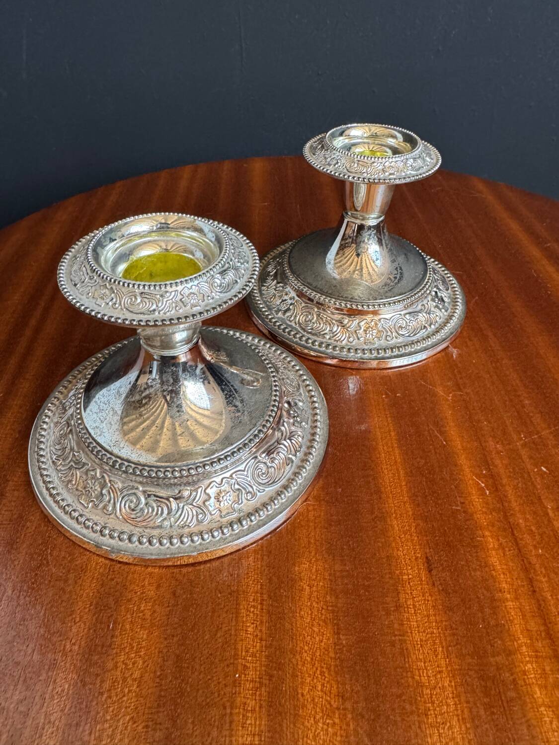Silver-plated metal candlesticks from the 1980s.