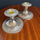 Silver-plated metal candlesticks from the 1980s.