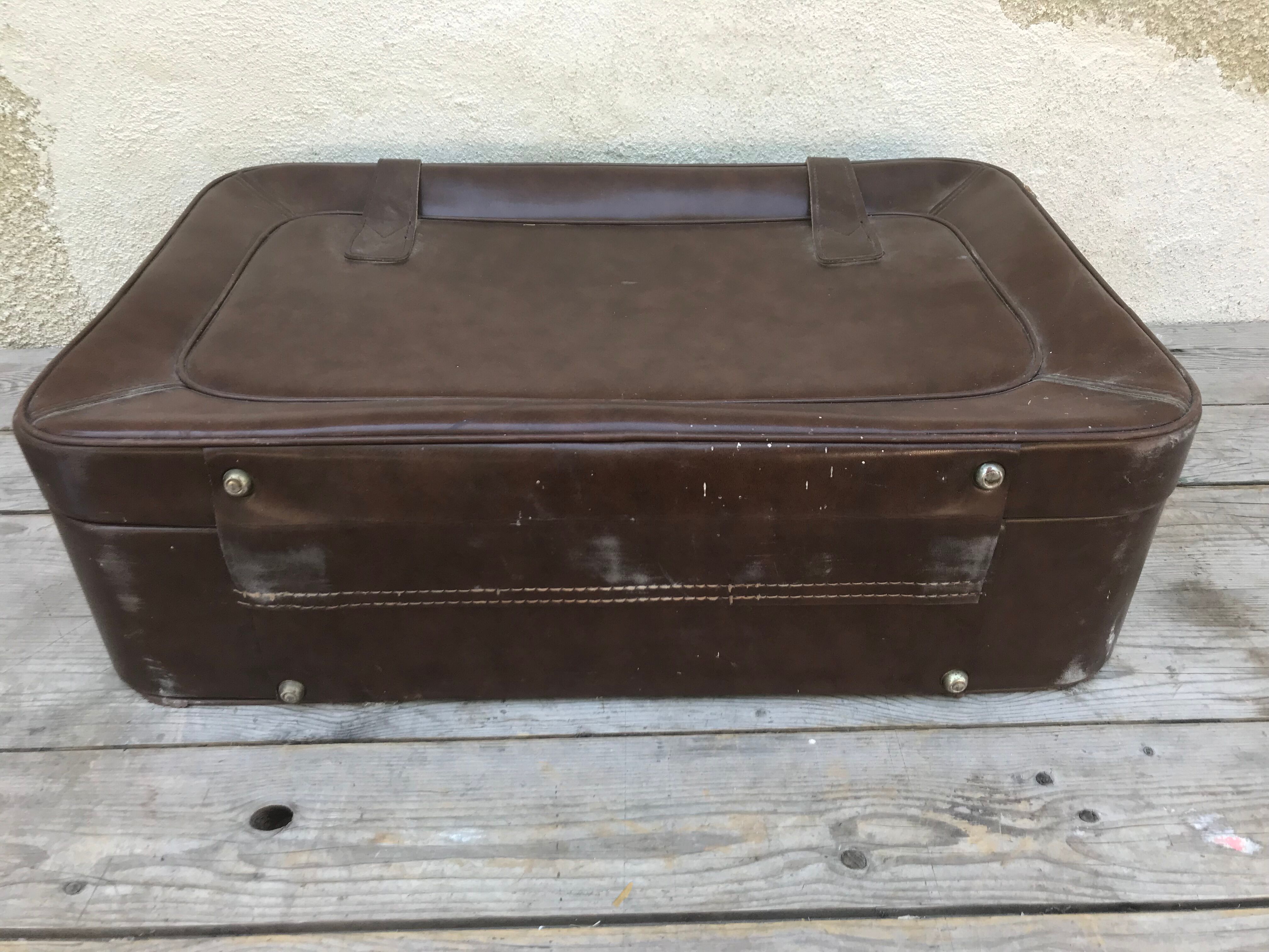 Old suitcase travel leather brown