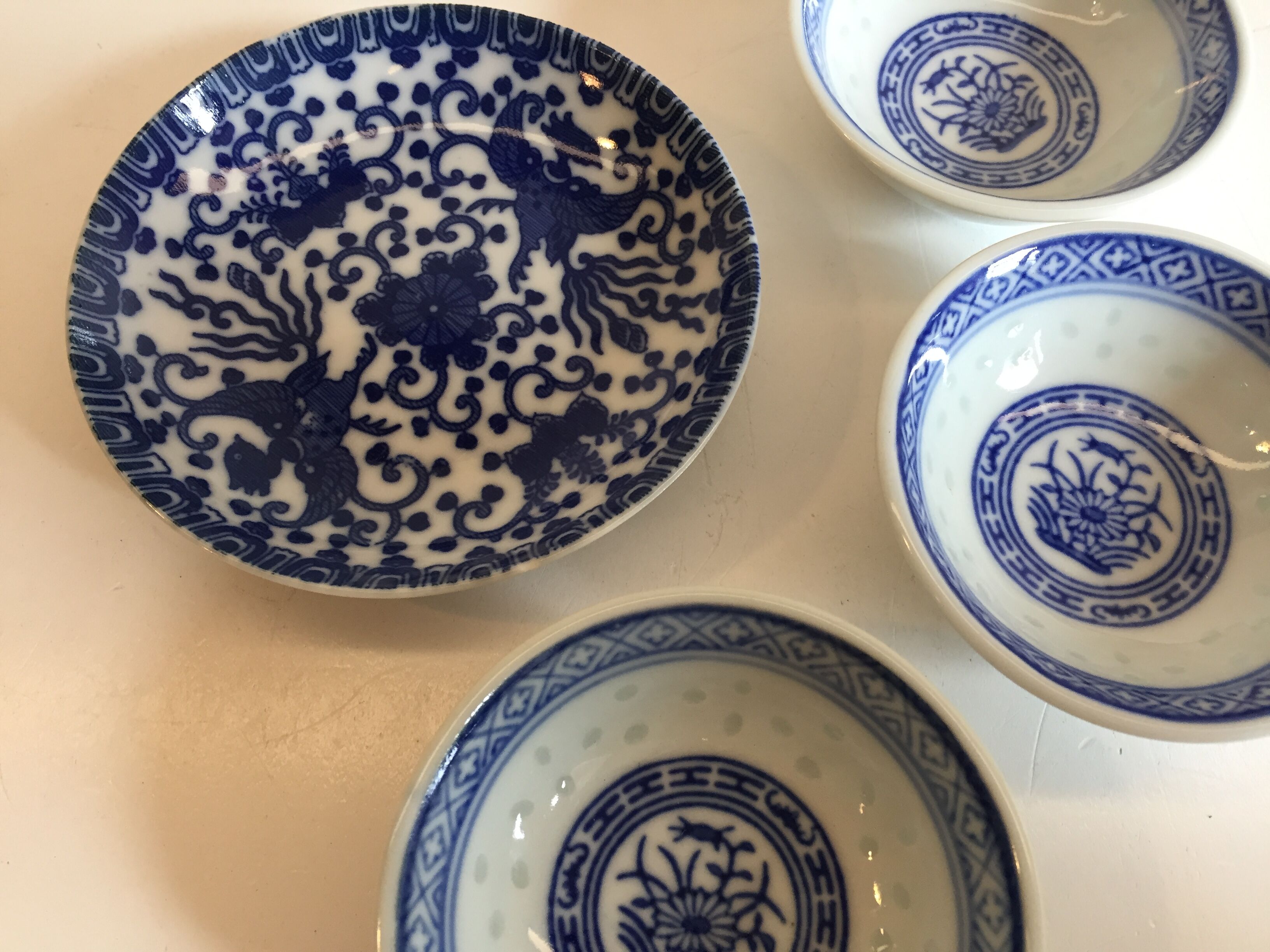set of 4 bowls and 4 asian porcelain cups