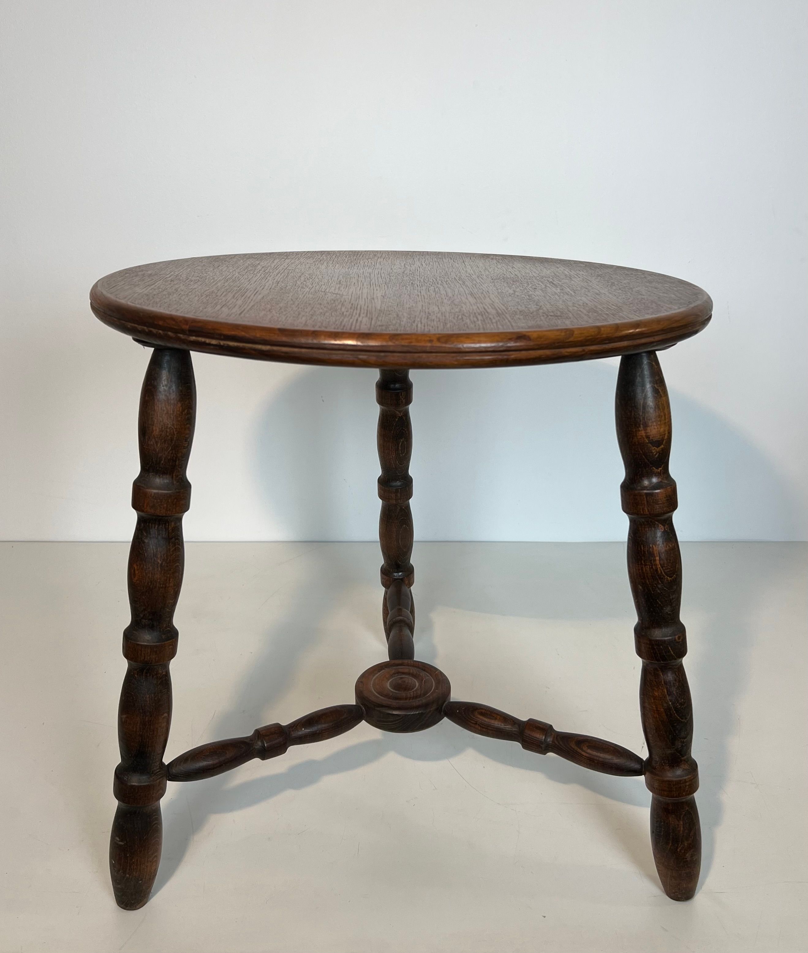 Turned wood coffee table by Charles Dudouyt