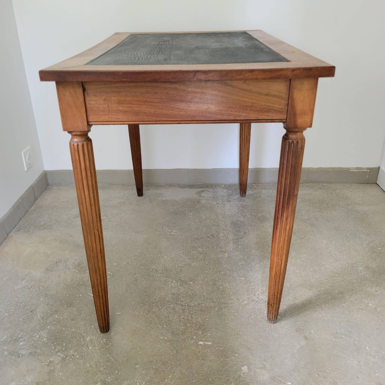 Antique desk made of solid wood and leather.
