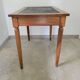 Antique desk made of solid wood and leather.