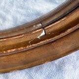 Witch's mirror with wood frame and curved ice