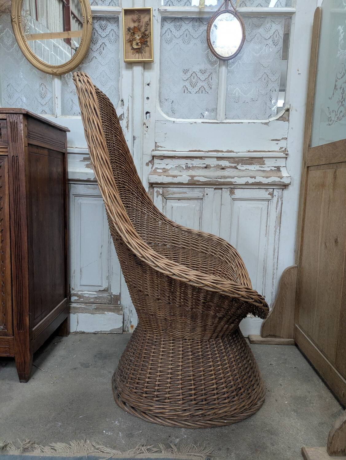 Large woven rattan armchair