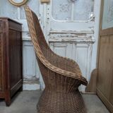Large woven rattan armchair
