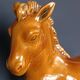 Ceramic horse sculpture with wild glaze and gold, signed Art Deco.