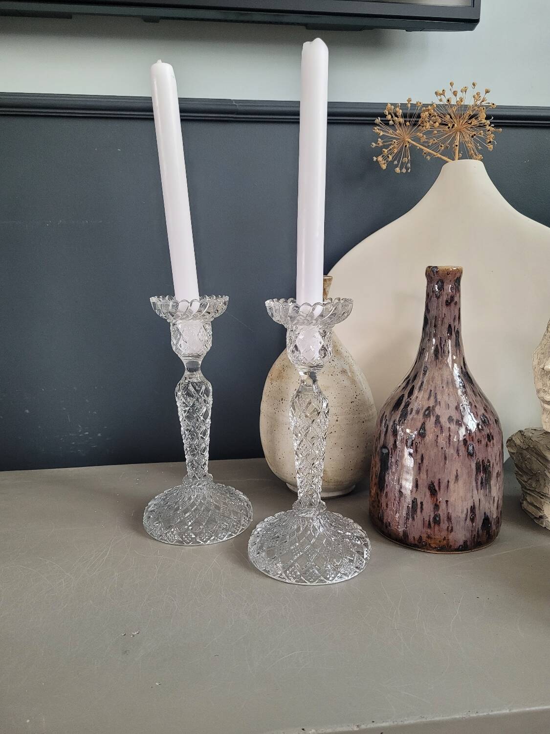 Pair of antique molded glass candlesticks