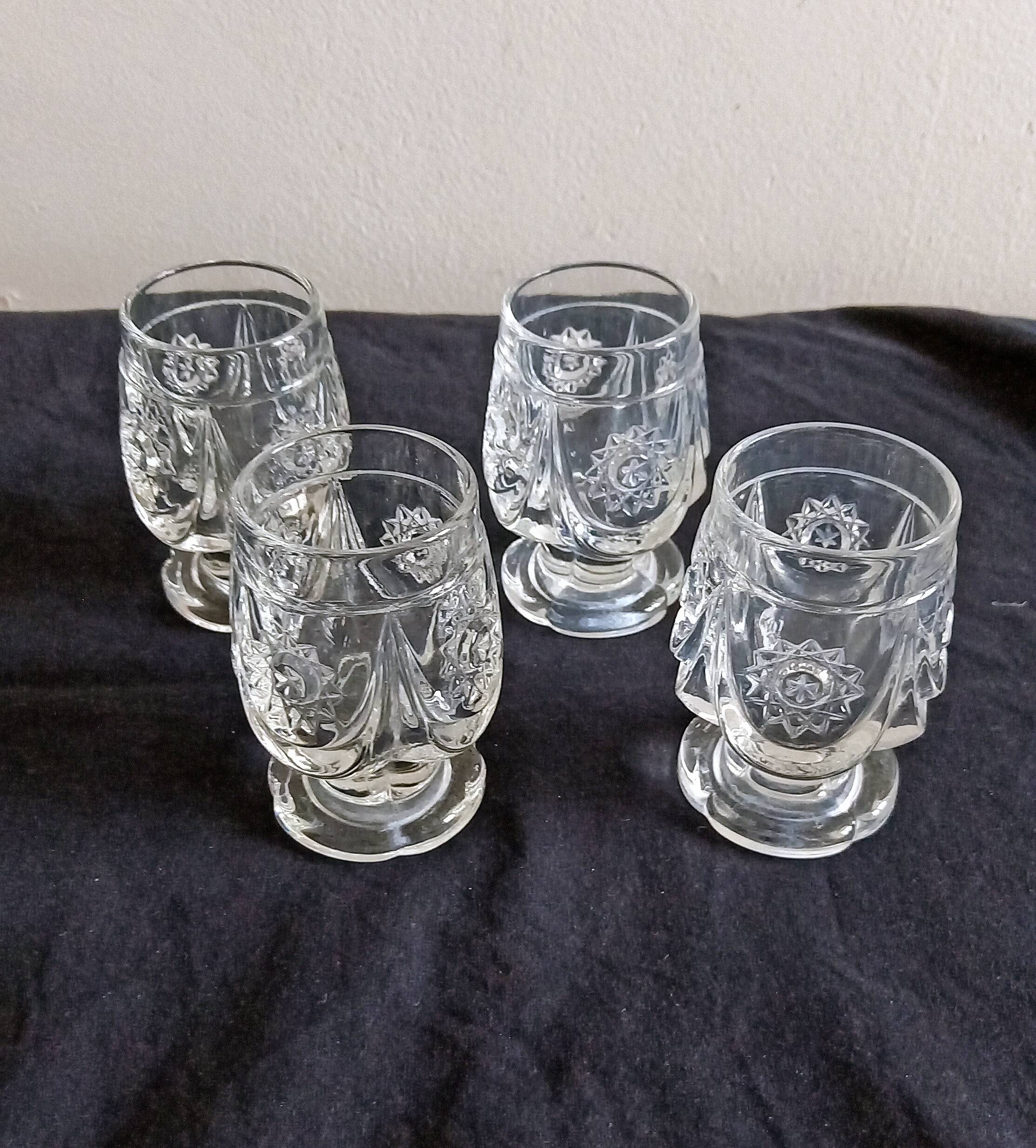 4 antique to digestive glasses in cut crystal and molded crystal decorated