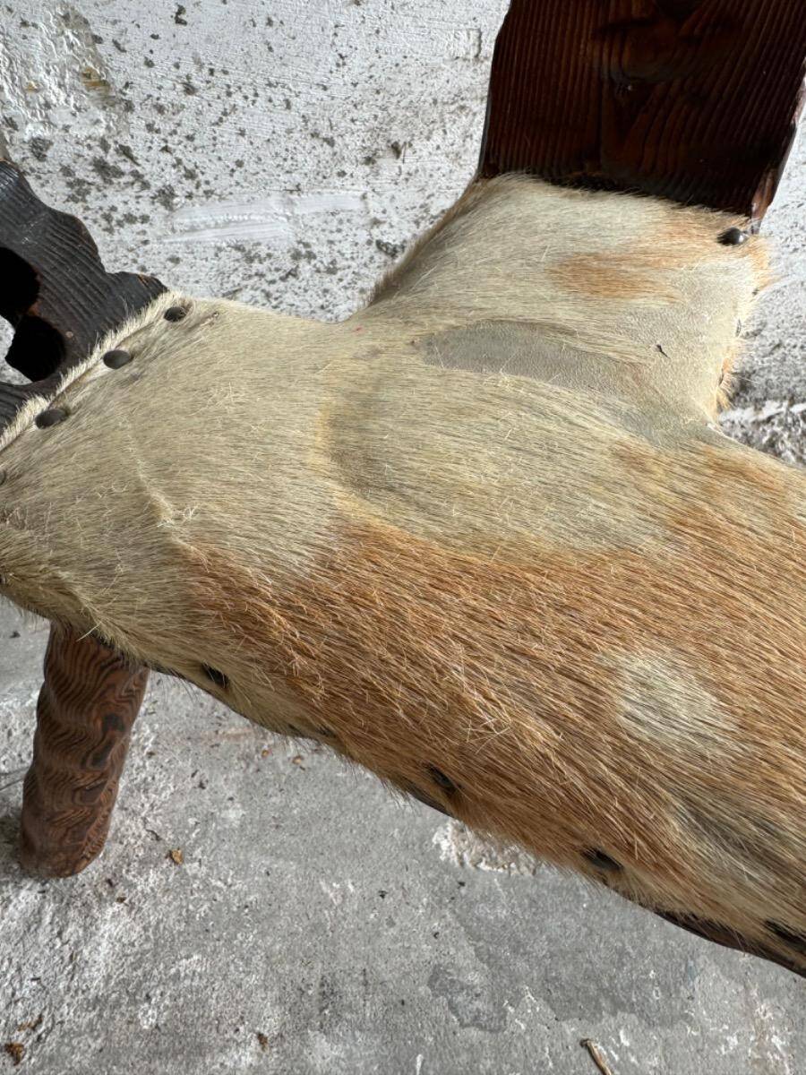 Pair of 1950s Spanish carved solid wood chairs with beige cowhide leather seats