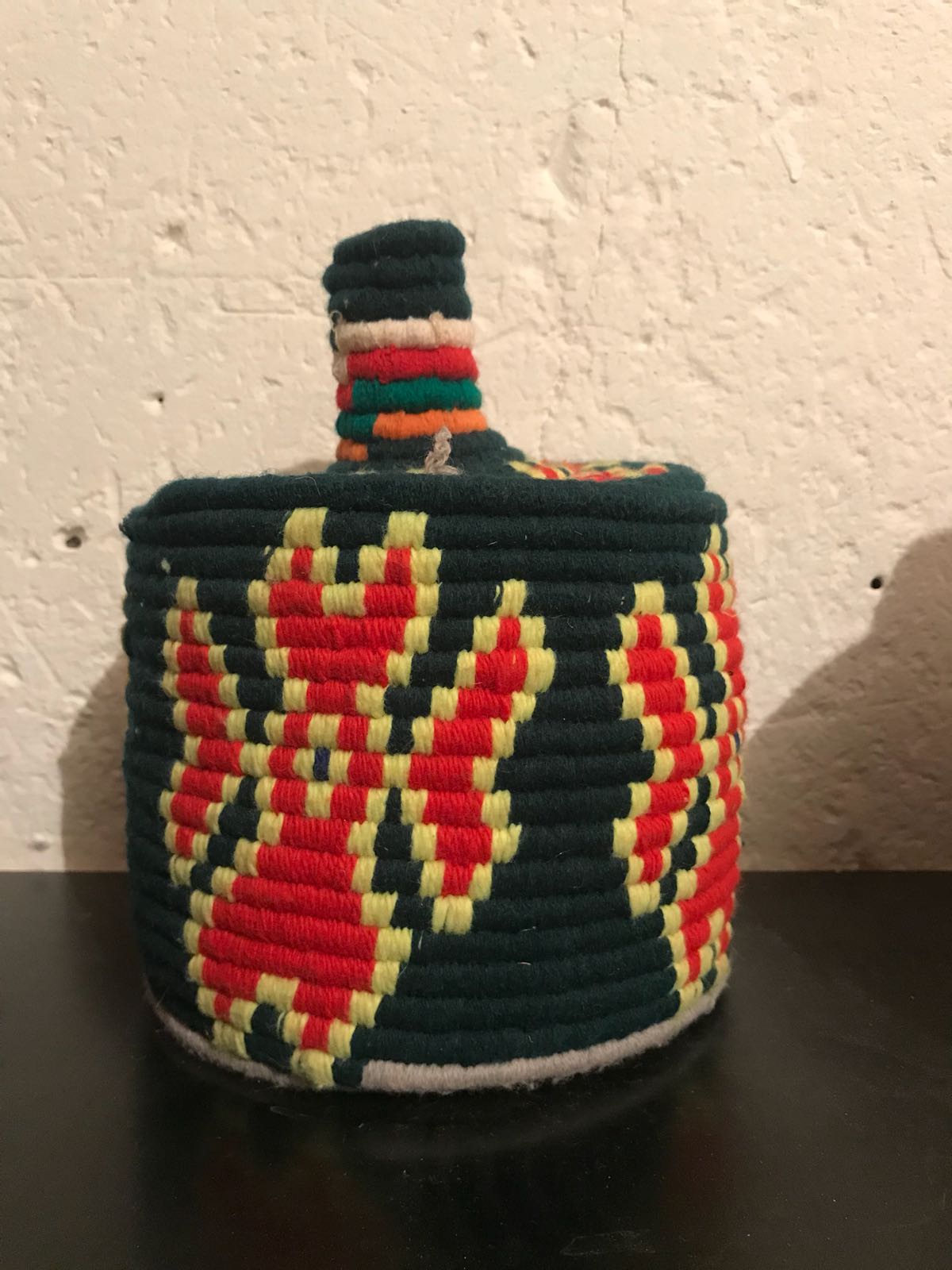 Berber basket in black and red wool and raffia