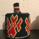 Berber basket in black and red wool and raffia