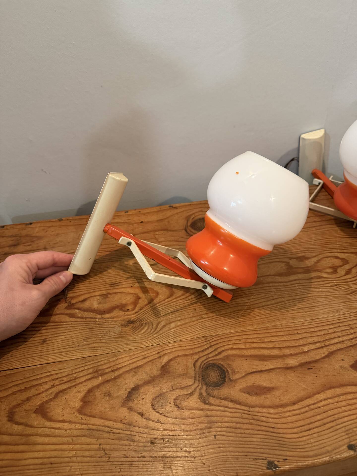 Pair of Space Age design wall lights in metal and vintage opaline.
