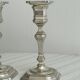 Pair of patinated silver-plated candlesticks