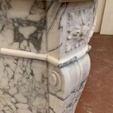 Cheminée de style Louis XVI en marbre blanc veiné de carrare XIXème siècle