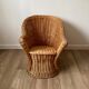 Braided wicker armchair