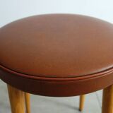 Baumann low stool from the 60s in brown leatherette