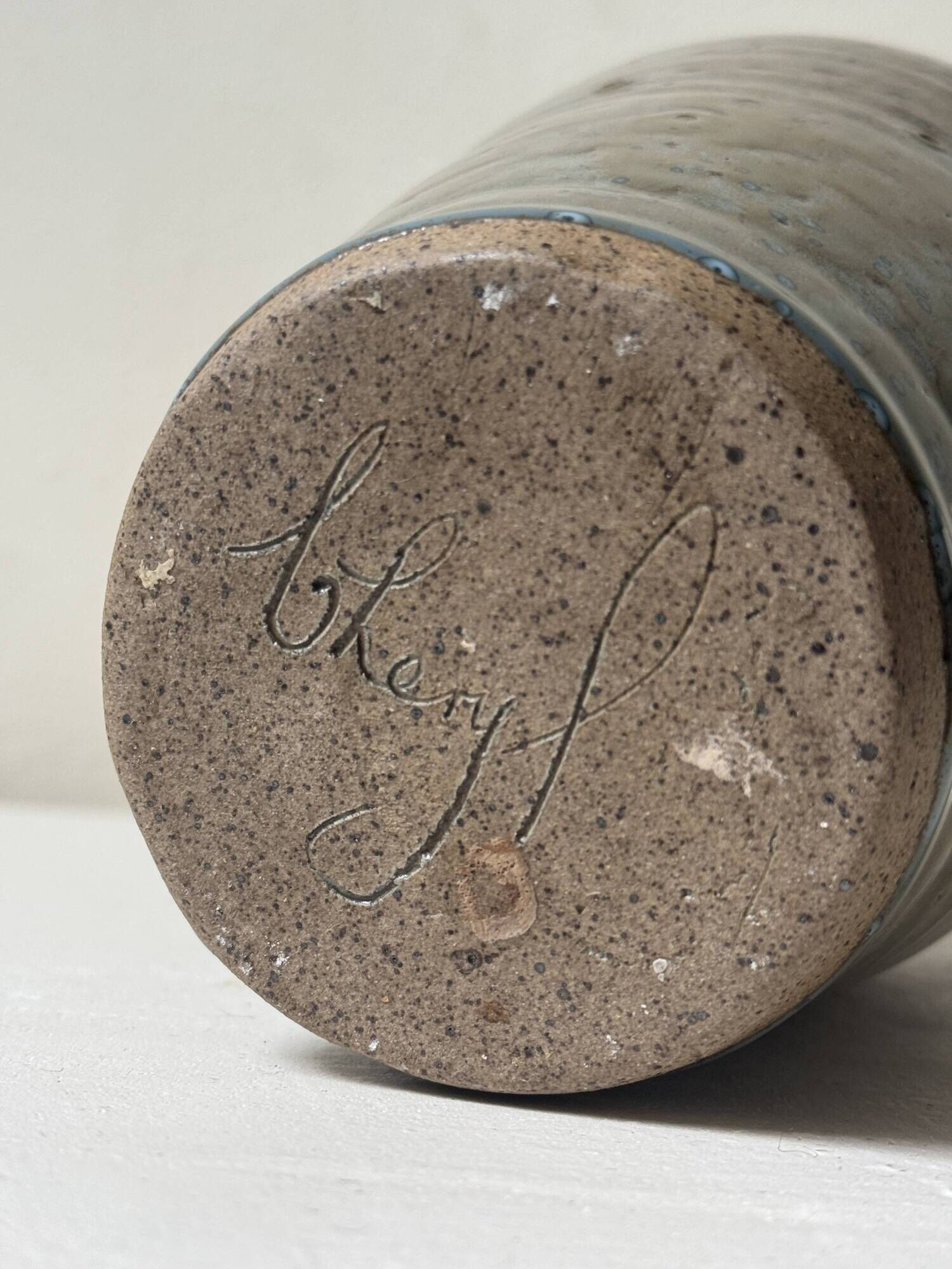 Brown-black glazed stoneware vase, signed underneath the base, circa 1950.