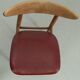 Chaise vintage avec simili cuir rouge