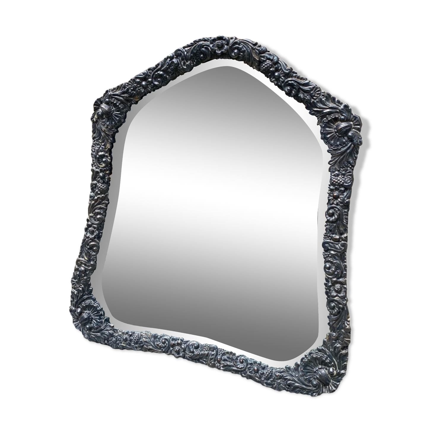 Old mirror carved in gray metal