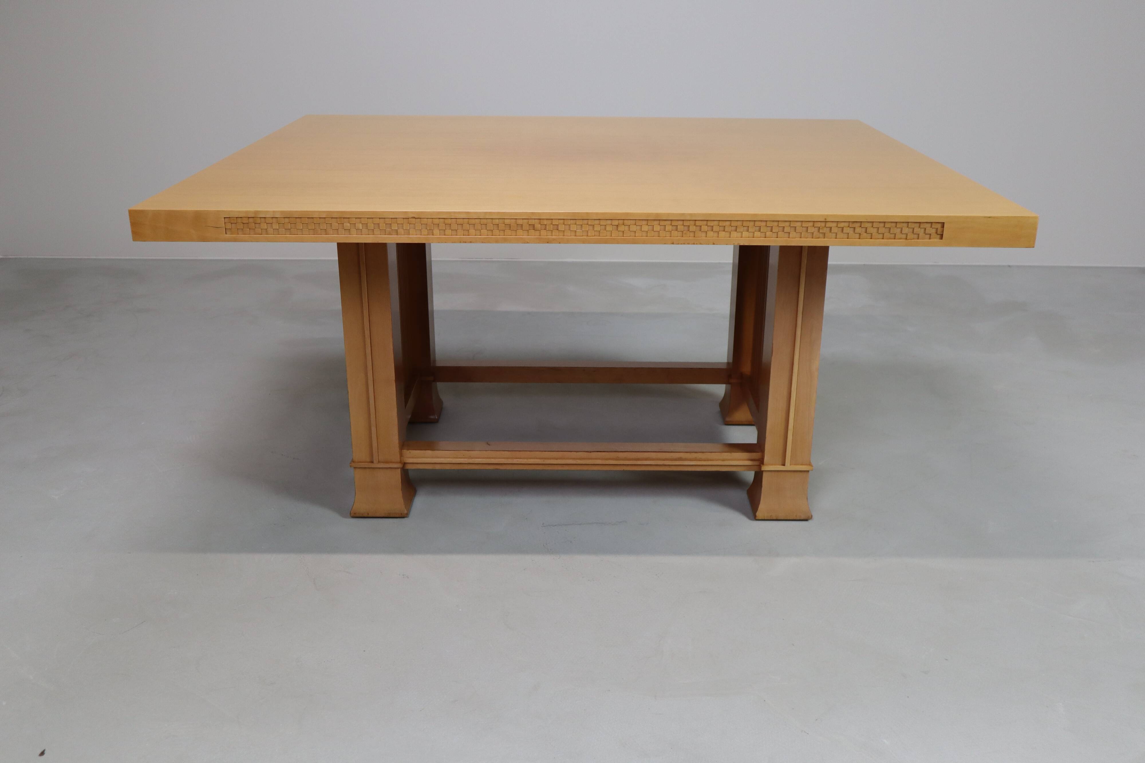 Husser 615 dining table by Frank Lloyd Wright produced by Cassina