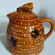 Set of old teapots and honey pot