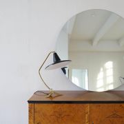 Brass table lamp on a tripod in modern Swedish style, Sweden, 1950.