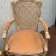 Pair of Louis XVI style armchairs in 20th century patinated beech