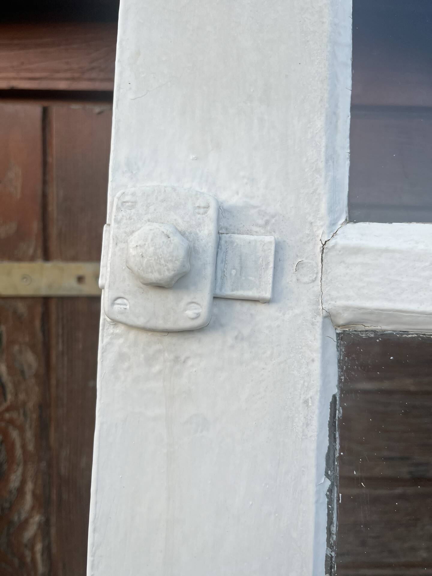 Porte d'entrée ancienne semi-vitrée en bois