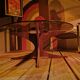 Vintage coffee table from the 60s and 70s by Hugues POIGNANT, smoked glass & teak.