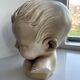 Child bust made from resin by Antoine Paridon, signed 240 A.P.