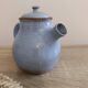 Ceramic teapot in blue/grey glaze, signed by Jeanne and Norbert Pierlot.