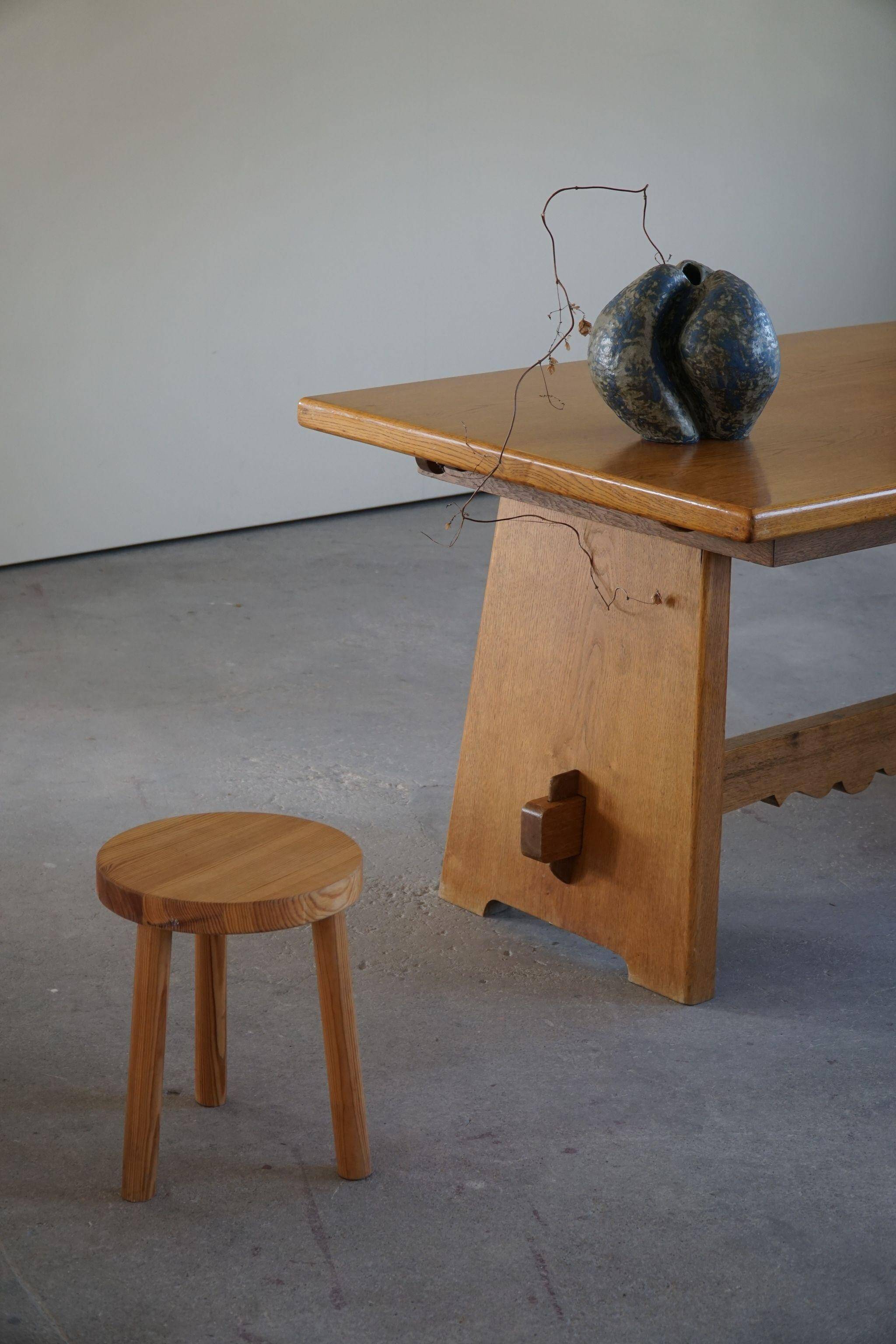 Mid-century brutalist dining table, made of oak, Danish craftsmanship, 1950s.