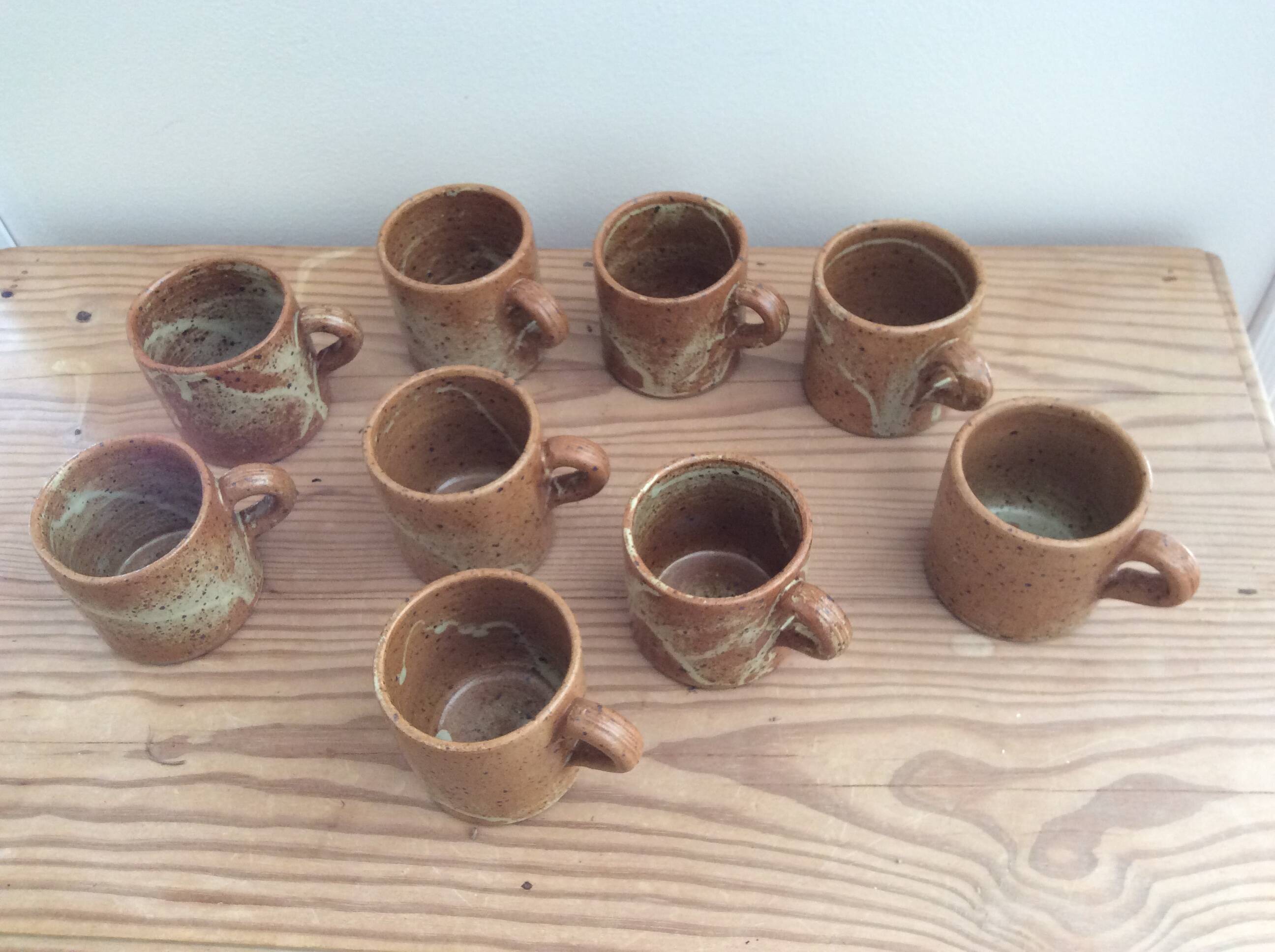 9 stoneware coffee cups