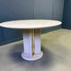 Round French travertine dining table 1970s