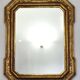 Miroir mural octogonal italien vintage en bois doré, décor bulliné
