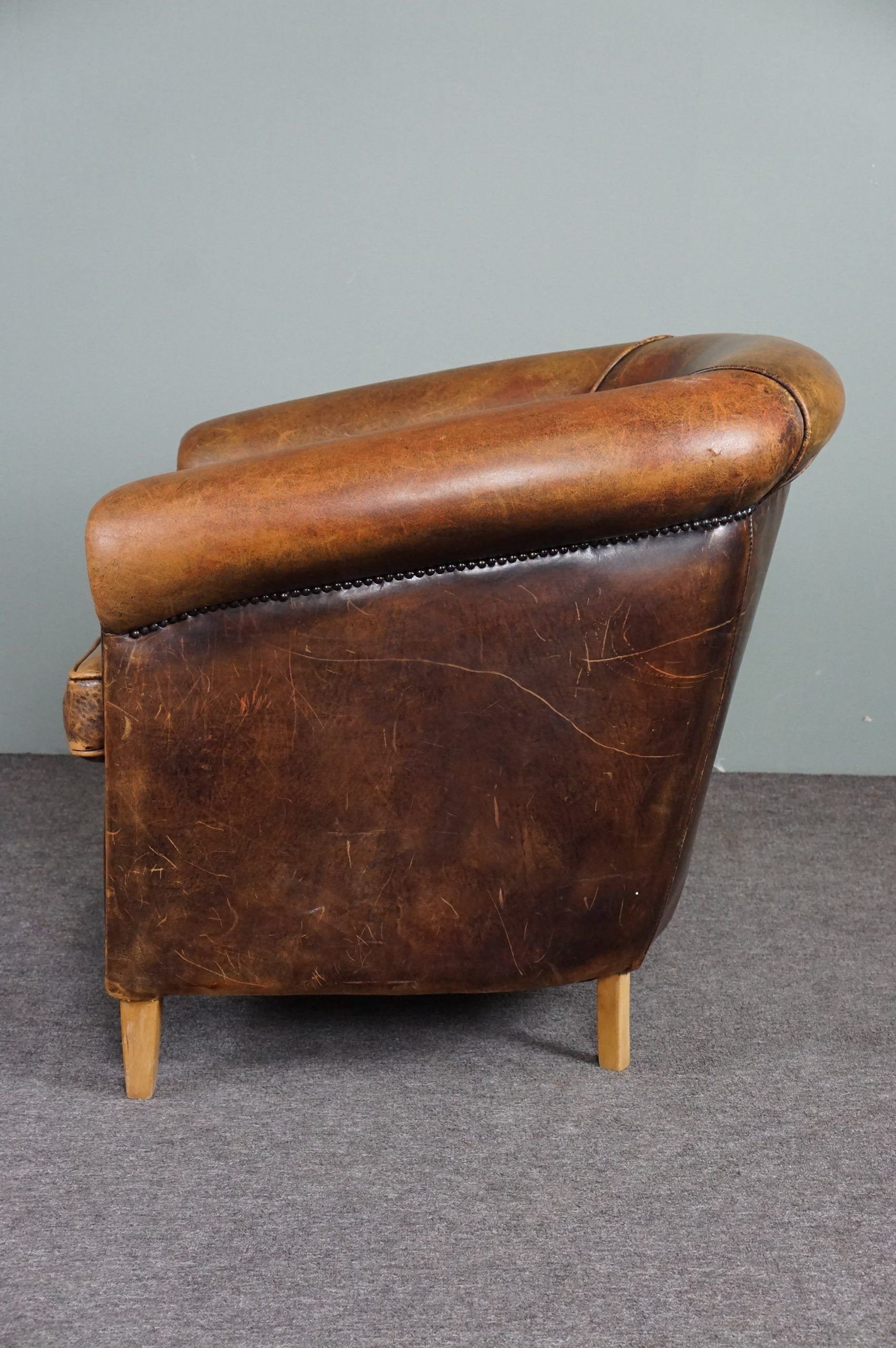Fauteuil club en cuir de mouton
