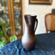 Glazed terracotta pitcher stamped jean dubost
